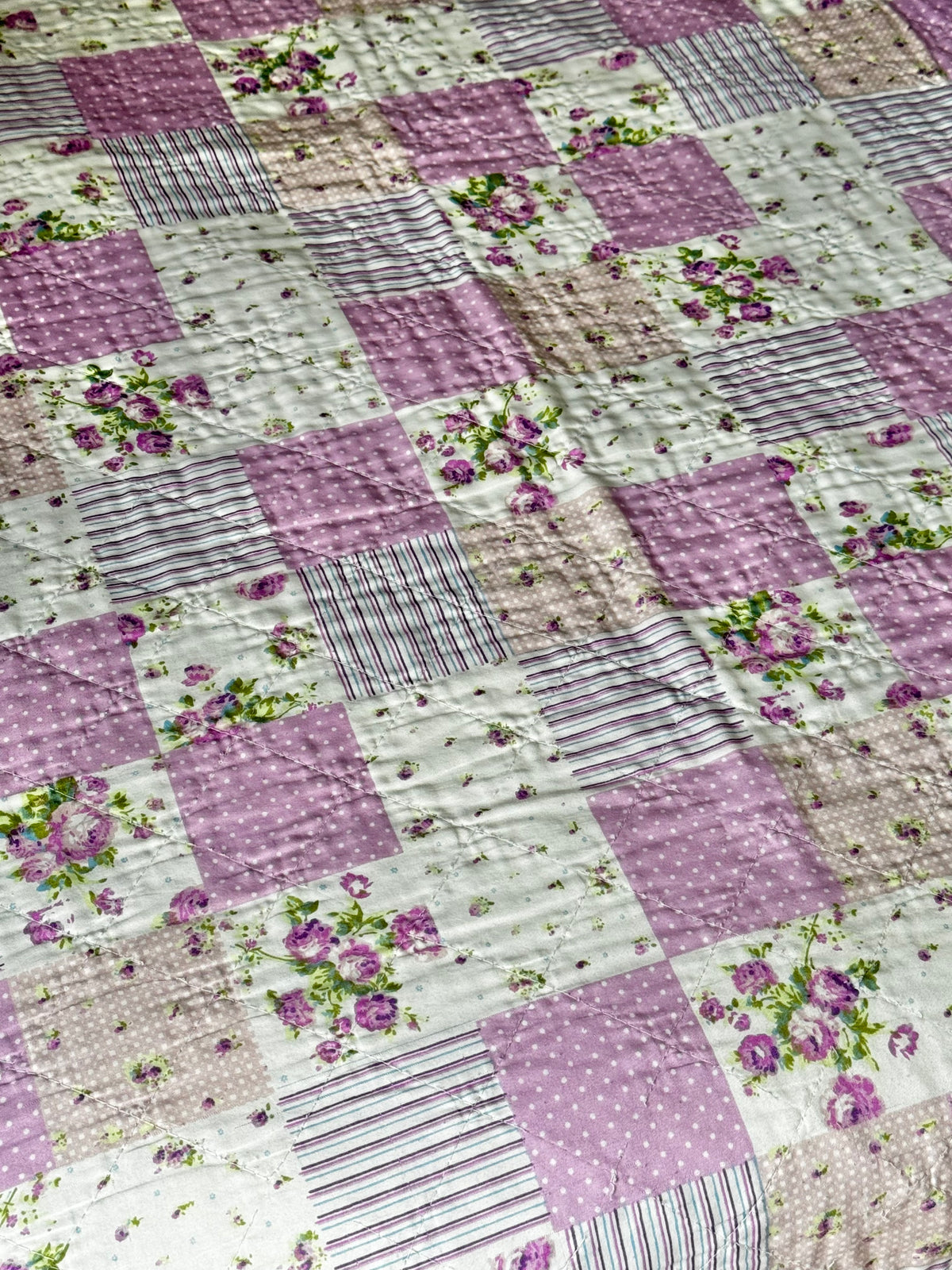 Romantisk patchworktæppe