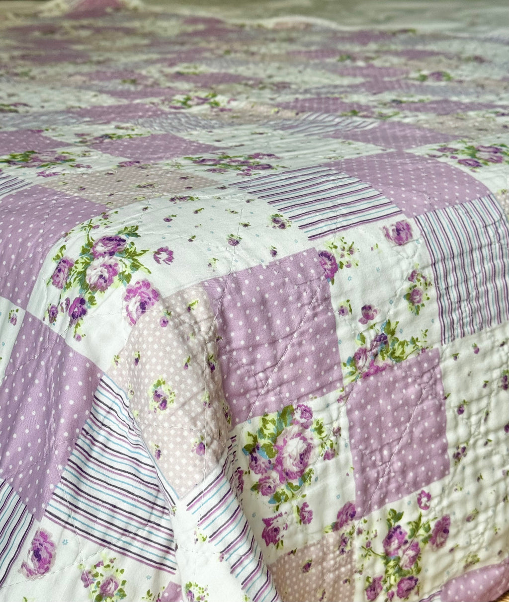 Romantisk patchworktæppe